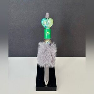 Gray and Green Decorative Pen